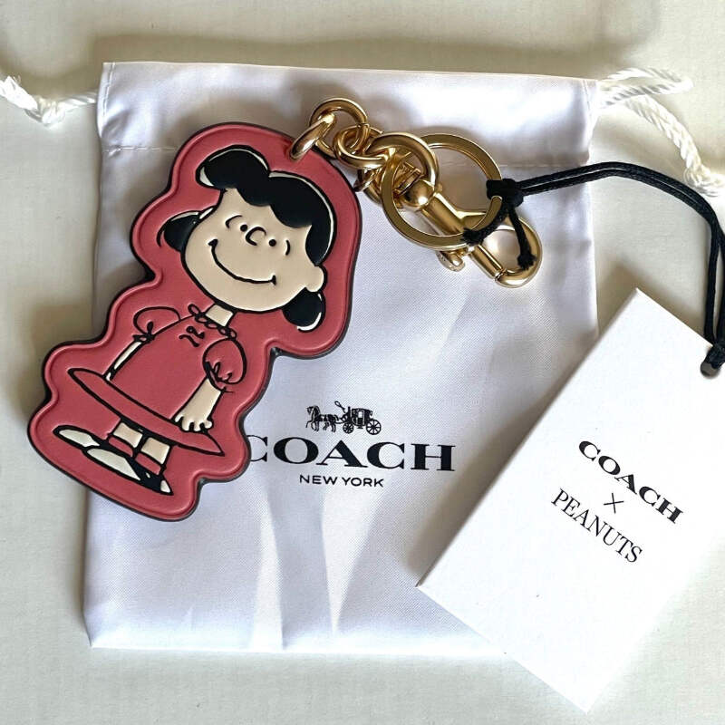 【COACH X PEANUTS】コーチ ライナス / ルーシー バッグチャーム Coach x Peanuts 2025 Lucy Leather Bag Charm Keychain CBG58